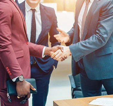 Business partnership handshake