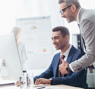 Small business mentor working with colleague